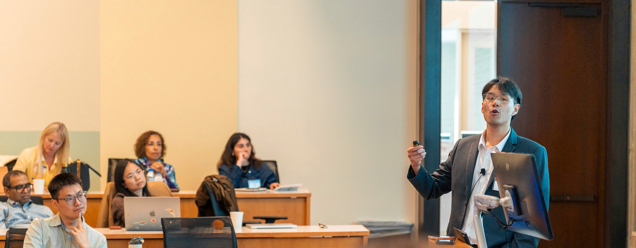 Kenny presenting at the 2026 Wharton Generative AI & Business Conference